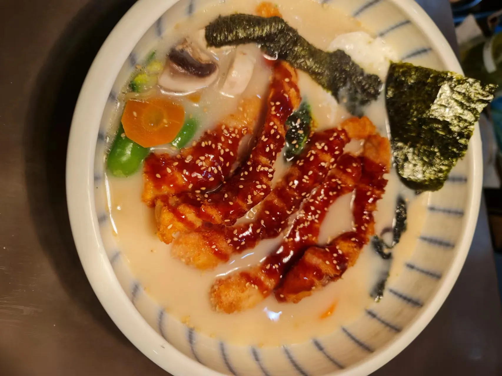 A Japanese dish from the Blue Fin kitchen -- a noodle or rice dish with fresh ingredients